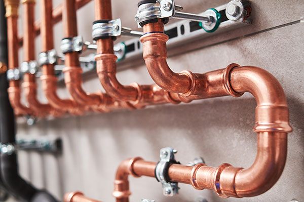 stock photo plumbing service copper pipeline of a heating system in boiler room 1614456811 klein